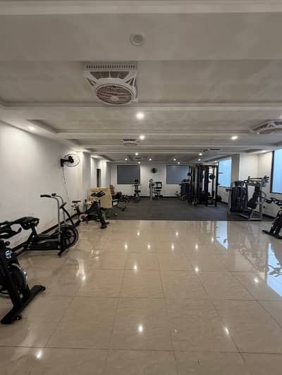 commercial Space available for rent ideal for brand mezenine floor in main shahrai Pakistan