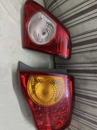 Genuine back lights Corolla 2010 model 10/10 condition