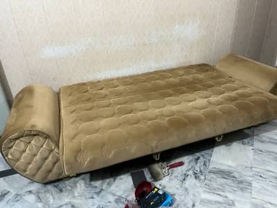 Sofa bed 9/10 condition golden bht acha hai  just like new