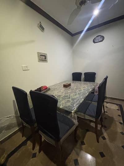 Unused Dining table with 6 chairs