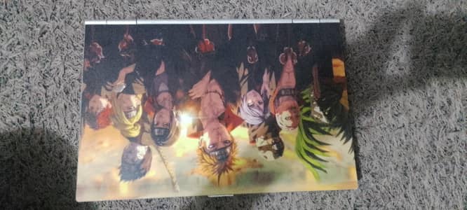 laptop with Original Charger and limnated with Naruto characters
