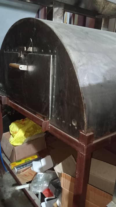 Pizza oven and baker