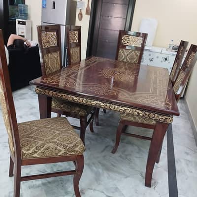 solid dinning table selling due to space issue