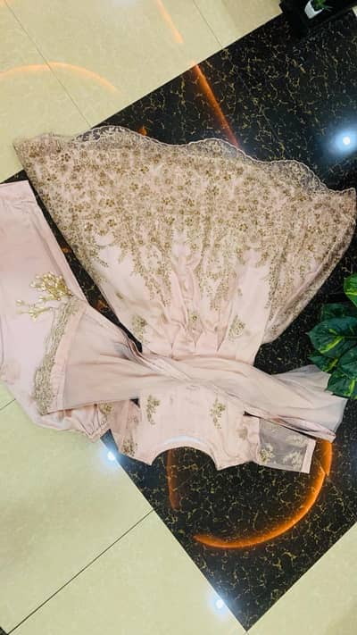 2 dress in brand new condition cholli lehnga and maxi with pearl cut