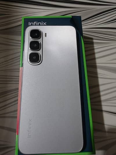 Infinix Hot 60i  6/128Gb with box chrger 11 month warranty