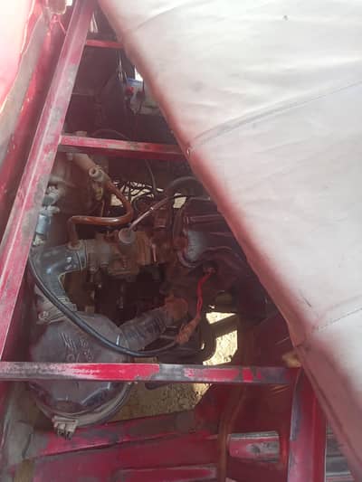 auto riksha Hy achi halat my Hy injan Tyr batry  sab ok Hy  docomints