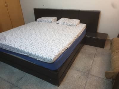 King size wooden bed