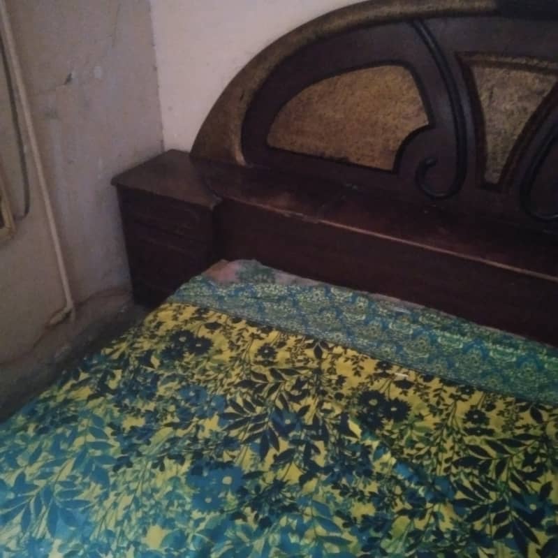 Double bed with fixed side tables 1