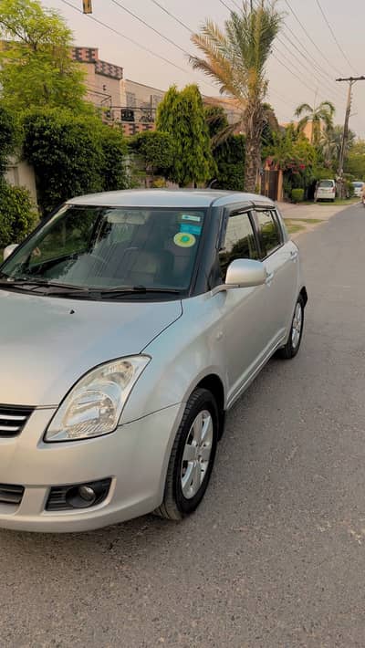 Suzuki Swift DLX 2012 total genuine