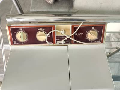 Brand New condition sharp washing machine with both washer & dryer