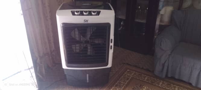 SK-4500 65 ltr ka room cooler h ik season used h bilkul condition 9/10