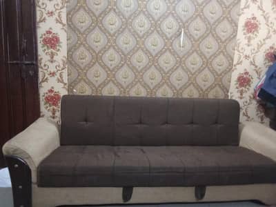 brown and beige sofa combed
