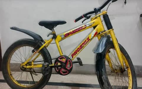 Used Yellow Pheonix X kids Bmx bicycle - 22 inches
