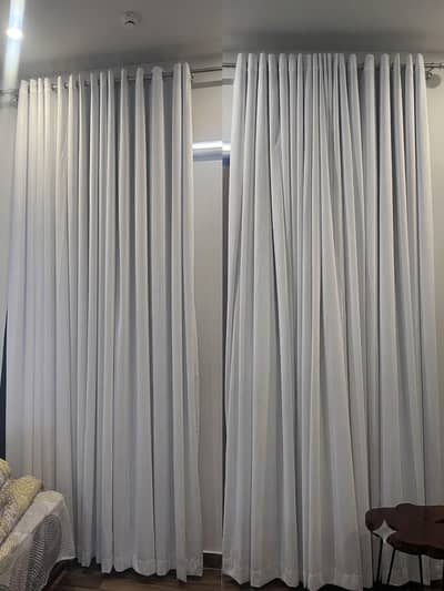 White curtains fill length
