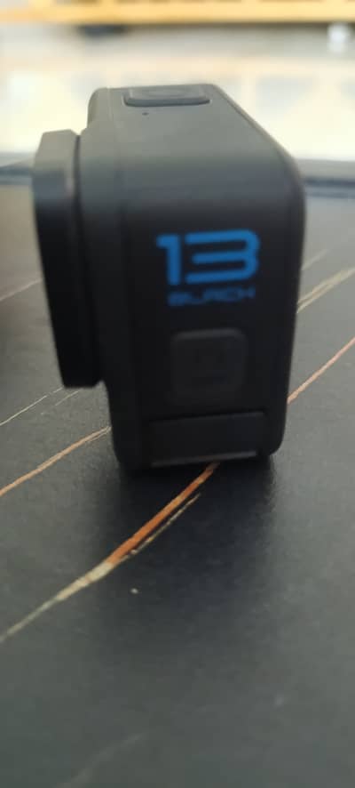 **GoPro HERO13 Black Action Camera with Standard Accessories**  Captur