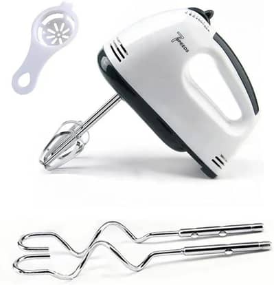 white electric hand mixer with 7 different speeds and attachments