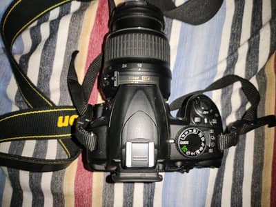 Nikon D3100 DSLR Camera with 18-55mm