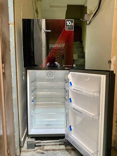 box pck conitidon Haier smart inverter olny 2 month used 0325161507