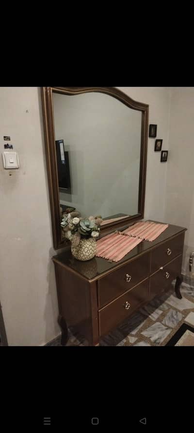 new bed with side table and dressing