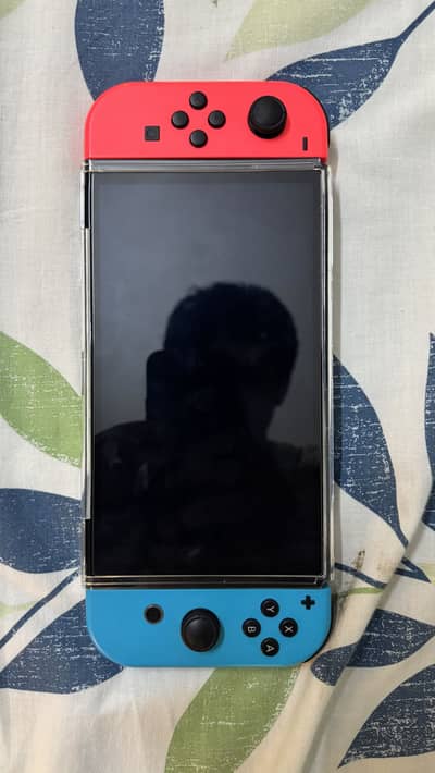 Nintendo Oled with alot of accesories avalible for sale in askari 11