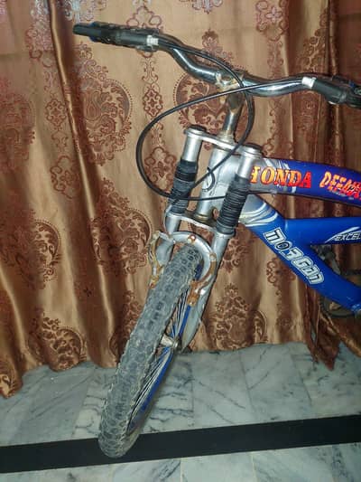 Blue Bicycle for 10 years kids in good condition for urgent sale