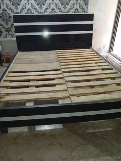 Double bed with side tables and dressing table and showcase