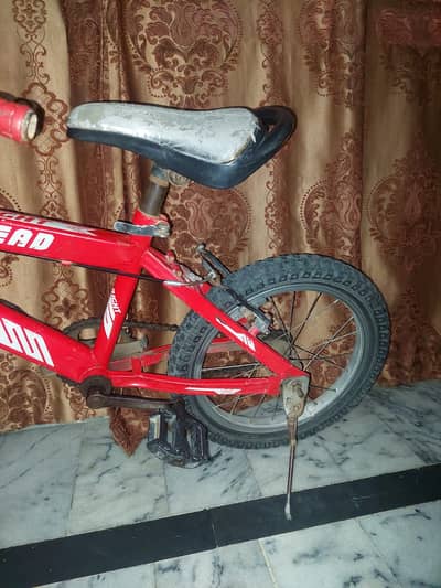 Red Bicycle for 6-8 years kids in good condition for urgent sale