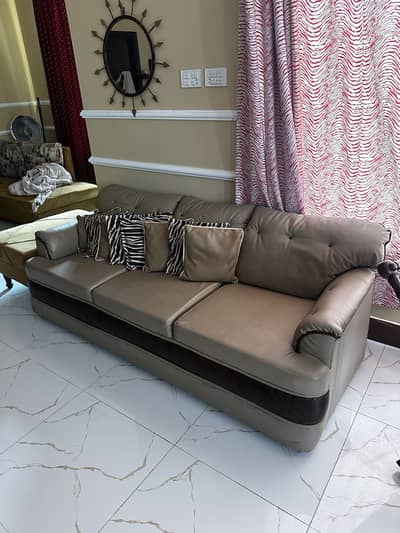 Tan colored sofa set