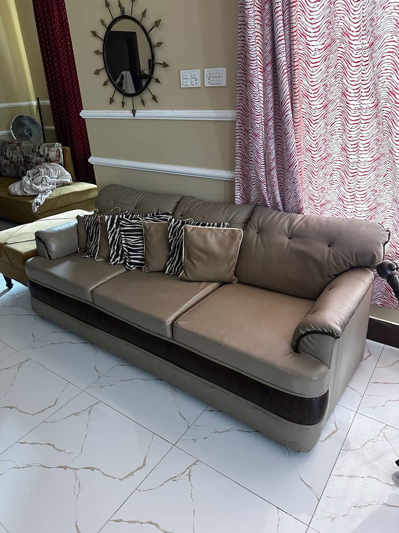 Tan colored sofa set 0
