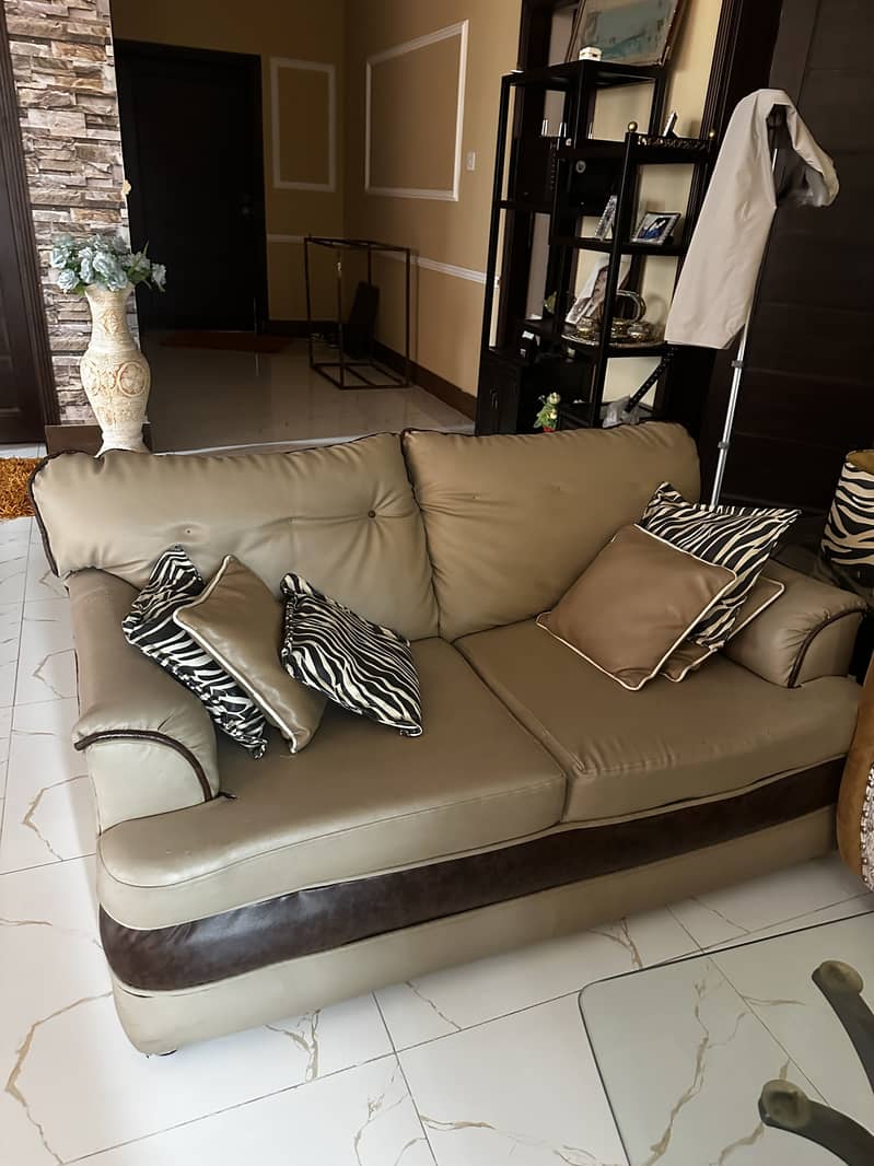 Tan colored sofa set 1