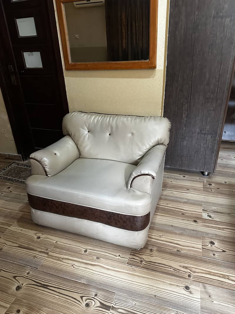 Tan colored sofa set 2