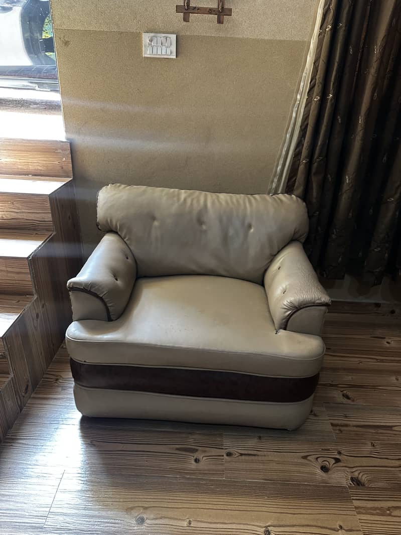 Tan colored sofa set 3