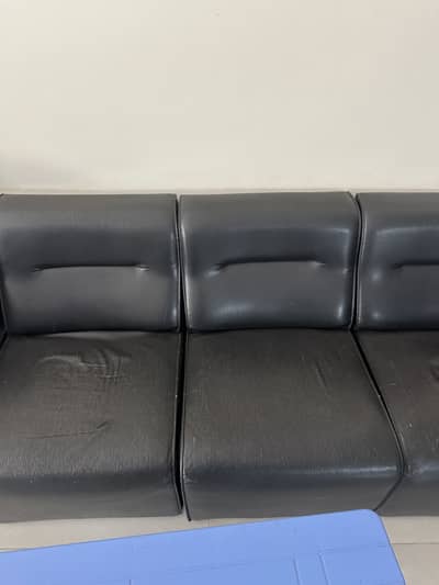 2 types of sofa 6 seats of black single and other is sofa set