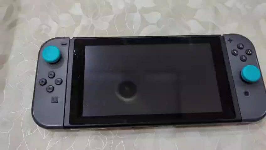 Nintendo Switch V2 with 128GB sd card 0