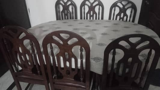 6 seater dinning table best quality wood 24 year old condition 10/8