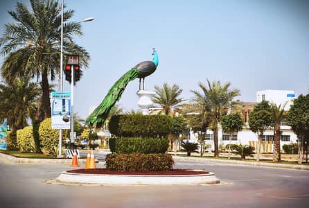 10-Marla Residential Plot With Possession & Utility Charges Paid For Sale In Johar Block , Sector E, Bahria Town Lahore.
