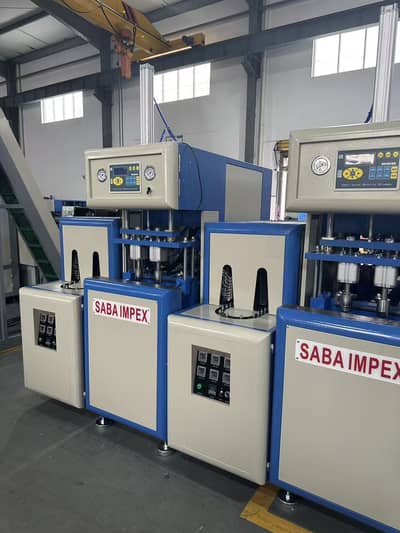 Pet bottles blowing machine semi automatic 2 & e cavity