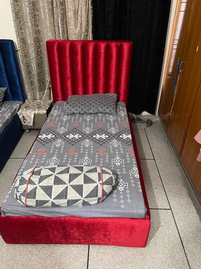 two single bed and study table