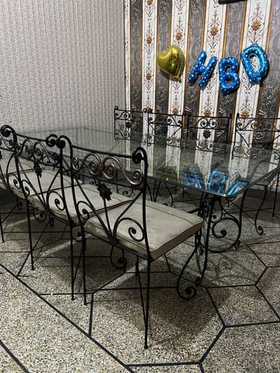 Glass dining table with 8 chairs