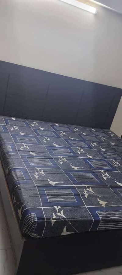 Kind Size Dark Brown Wooden Bed