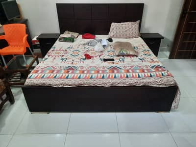 Full size bed with 2 side tables and 2 seater sofa