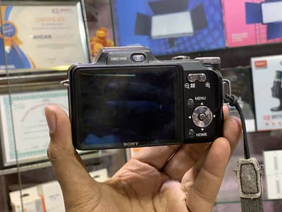 Digital camera sony battery charger big and one year Shop warranty