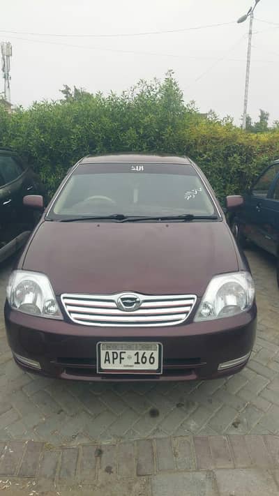 X Corolla 2003 , Maroon colour for Sale