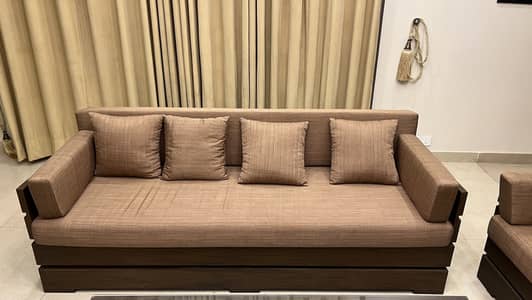 modern wooden sofa set with upholstered cushions