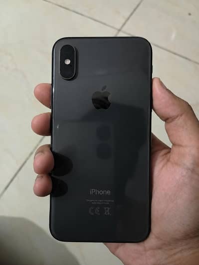 Apple iPhone XS with original charger and cable. .