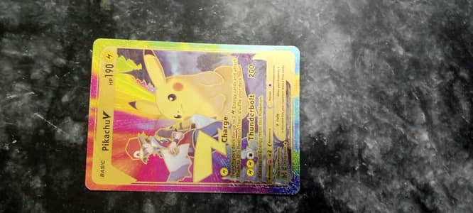 Rare golden pokemon cards of Pikachu and ash