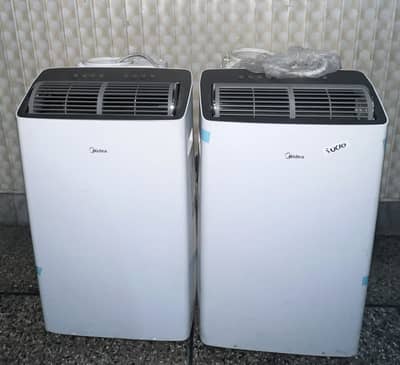 Midea Pordable ac new condition only1% use with steplizers