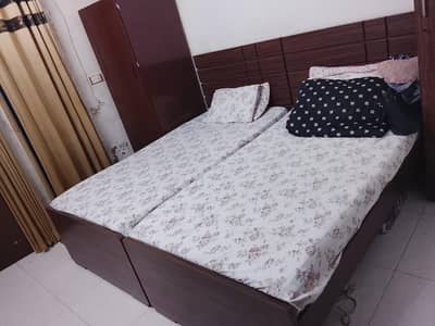 i am selling 2 single bed with mattress