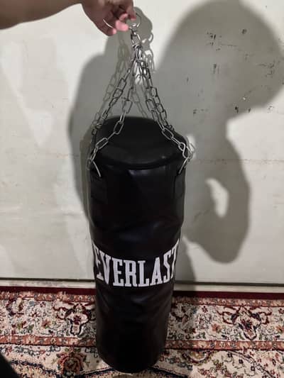 New punching bag with boxing gloves