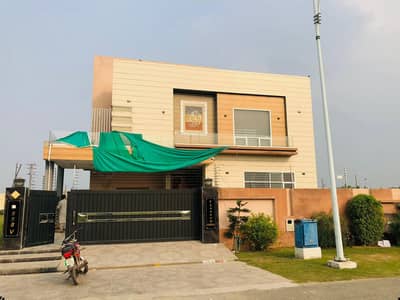 1 KANAL ELEGANT AND FULLY MAINTAINED SUPER HOT LOCATED BUNGALOW NEAR RAYA IS AVAILABLE IN THE BEST BLOCK OF DHA LAHORE.